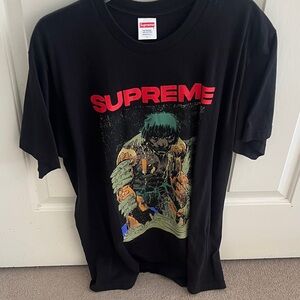 Supreme Black Tee with Bold Red Logo and Graphic